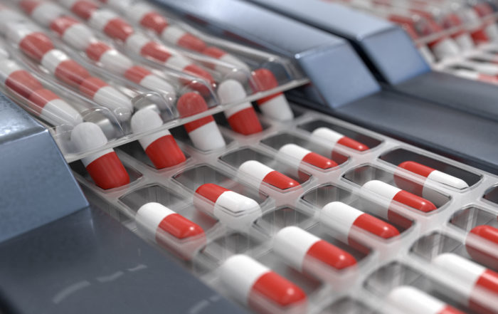 Red and white capsules in pharmaceutical production line. 3D rendered illustration.